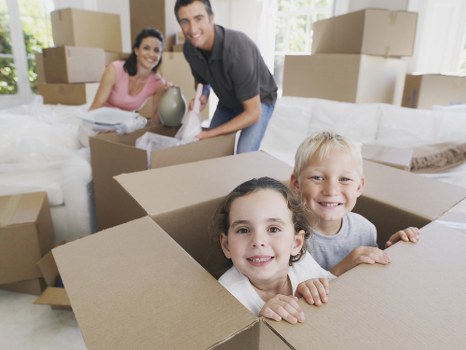 Removal team preparing items for a house move
