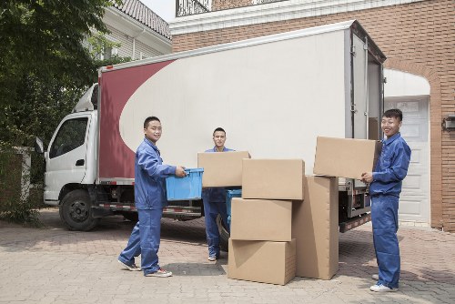 Moving van and household boxes in a Shepherdsbush street