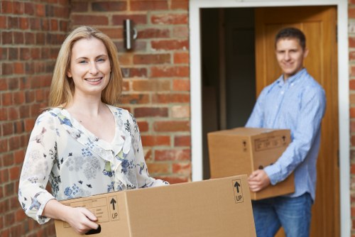 Staff preparing desks and boxes for an office move