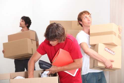 Packed moving boxes ready for a Shepherdsbush home removal