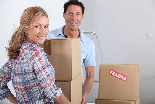 Packed boxes and furniture ready for removal truck hire
