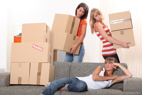 Packed boxes and furniture prepared for a home removal in West London